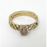 A 9ct gold ring set with white stone CONDITION: Please Note - we do not make