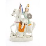 A Staffordshire pottery flat back knight on horseback. Approx. 11” high.