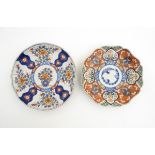 Two Imari plates with waved edges and floral decoration. Largest approx.