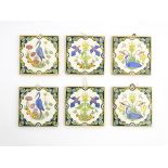 Three pairs of Minton, Hollings & Co. patent tiles, decorated with hand painted birds and flowers.