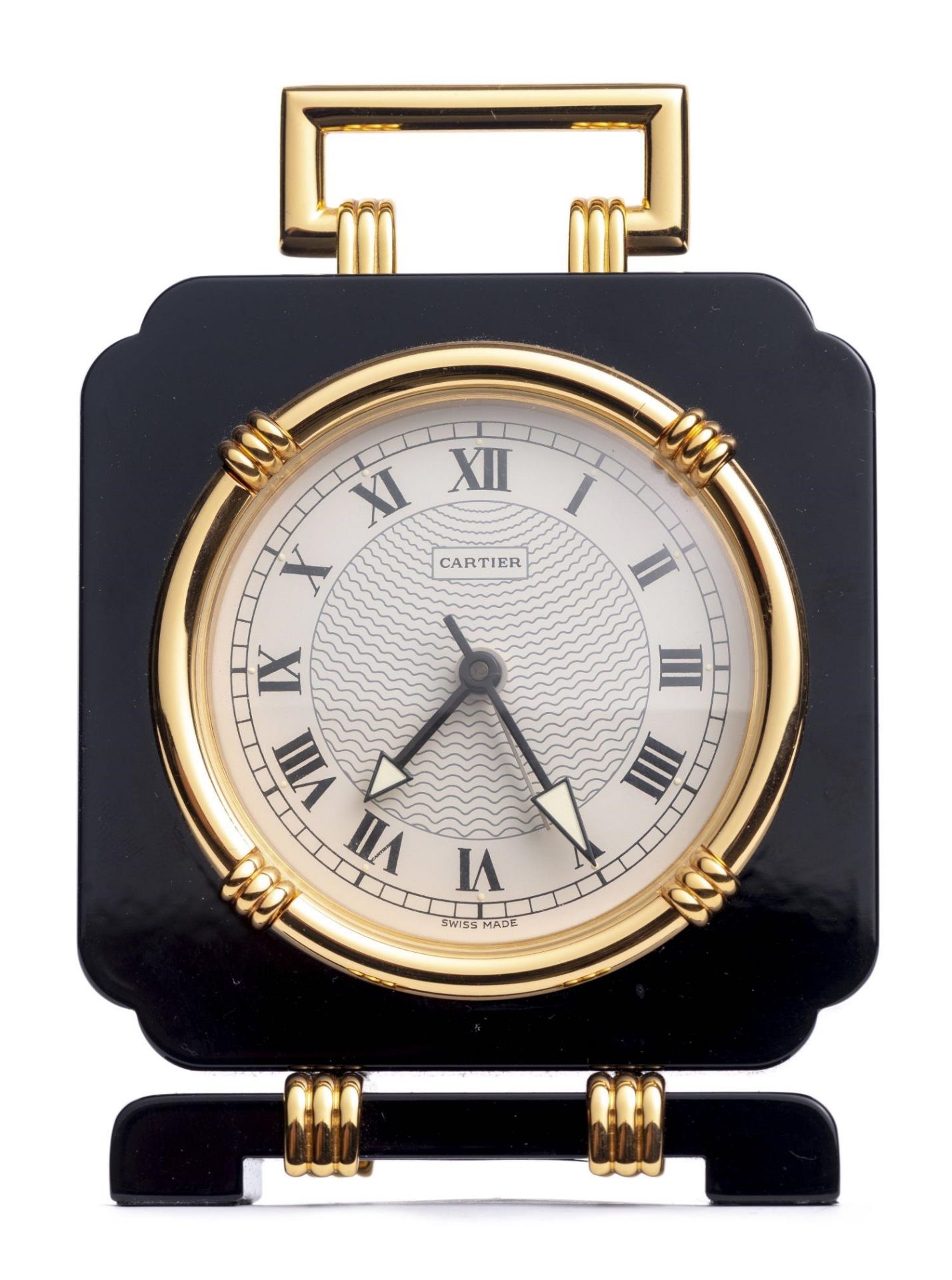 Cartier, pendulette-réveil de style Art déco à base rectangulaire, en métal doré [...]