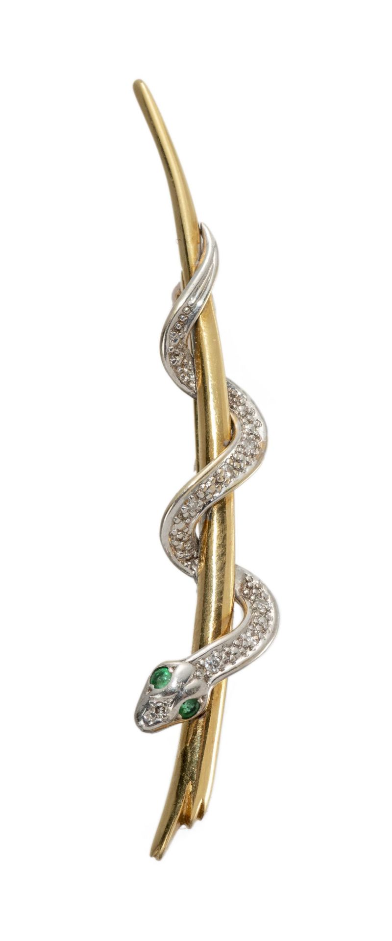 Broche en or .750 représentant un serpent, petits brillant et deux émeraudes à la [...]