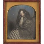 *Pair of sixth-plate daguerreotypes of young ladies, early 1850s, the first a tinted daguerreotype