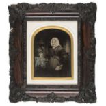 *Oversize half-plate ambrotypes of husband, wife and mother or mother-in-law, 1859, some tinting and