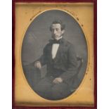 *Pair of quarter-plate daguerreotypes of a seated man, both 1850s, the first by Thomas Jones of a