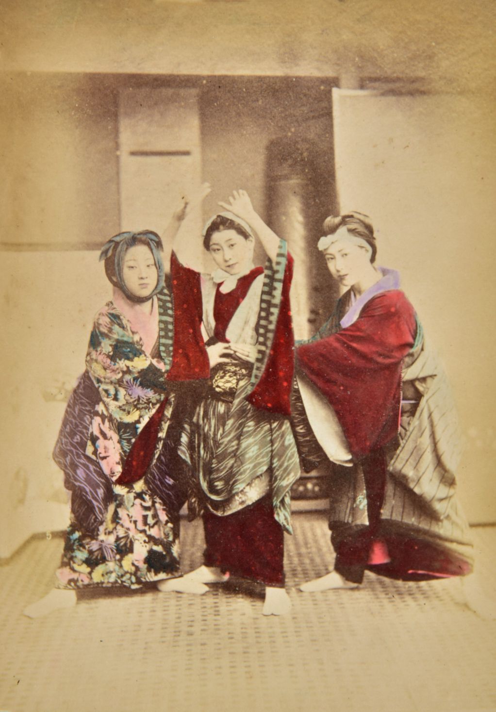 *Japan. A group of 48 hand-tinted albumen print photographs, c. 1890, subjects including Japanese