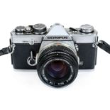 *Olympus and Carl Zeiss Jena Cameras. Collection of vintage SLR 35mm film cameras and lenses,