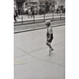 *Cartier-Bresson (Henri, 1908-2004). A one-legged boy on crutches in Berlin, 1951, vintage gelatin