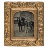 *Sixth-plate ambrotype of a stable-hand and two horses outdoors, 1860s, in French pressed metal wall