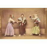Japan. An album of 48 mounted hand-tinted albumen prints, late 19th century, all portraiture shots