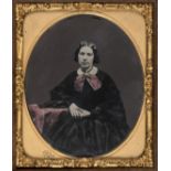 *Sixth-plate tinted ambrotype of a woman, by E. Eccles, artist, Agur Street, Bury, [Lancashire],