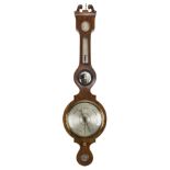 *Barometer. 19th century mahogany wheel barometer by T Briggs, Spalding, with silvered dials and