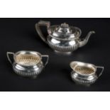*Tea Set. Edwardian silver three-piece batchelor's tea set, by Harry Atkin, Sheffield 1907, each
