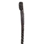 *Walking Stick. 19th century folk art wooden walking stick carved from a single piece, the knop