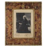 *Victoria (Queen of England, 1819-1901). Half-tone photographic portrait of Queen Victoria seated