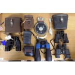 *Cameras. A collection of cameras and binoculars, including Yashica-A camera in brown leather