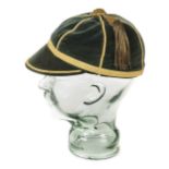 *Churchill (Winston S.). A late 19th/ early 20th century style green velvet rugby or football cap,