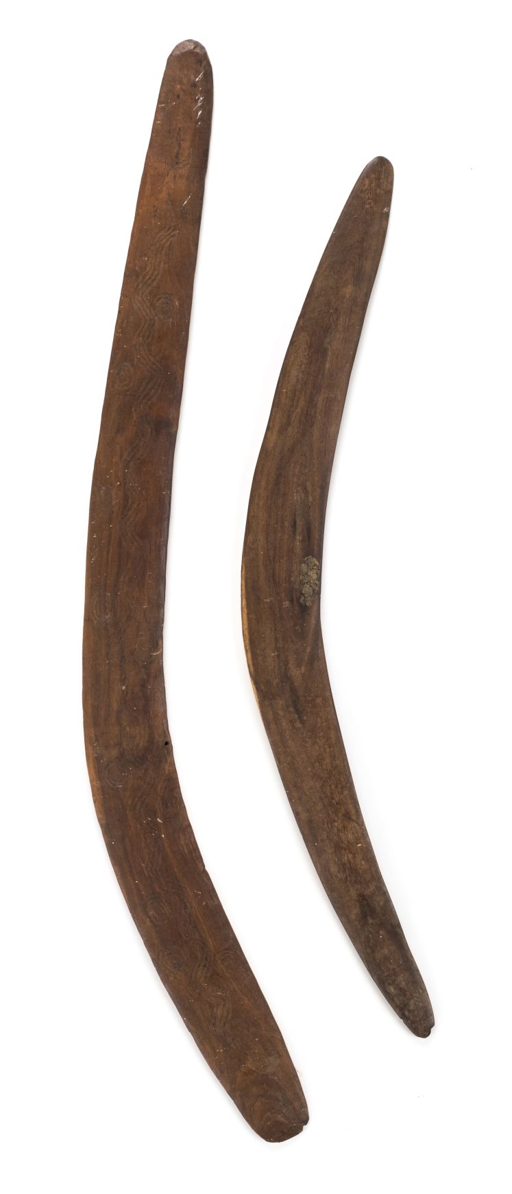 *Aboriginal. Australian hardwood boomerang, carved with roundels and wavy design, 79.5cm long,