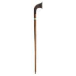 *Swagger Stick. A Victorian coromandel swagger stick by Brigg, London, the shaft with curved