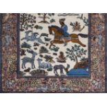 *Rug. A modern Persian woollen rug, with a figure on horseback and wild animals, including an