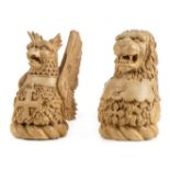 *Finials. A pair of small carved wood finial crests for the Hardy and Dugdale families, by L.M.