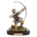 *Figure. A resin figure of an archer, the wooden base with brass plaque engraved 'English Longbow