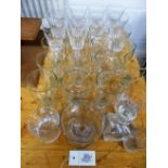 *Glassware. Mixed glassware, including 11 large stemmed wine glasses, 16cm high, 12 plain stemmed