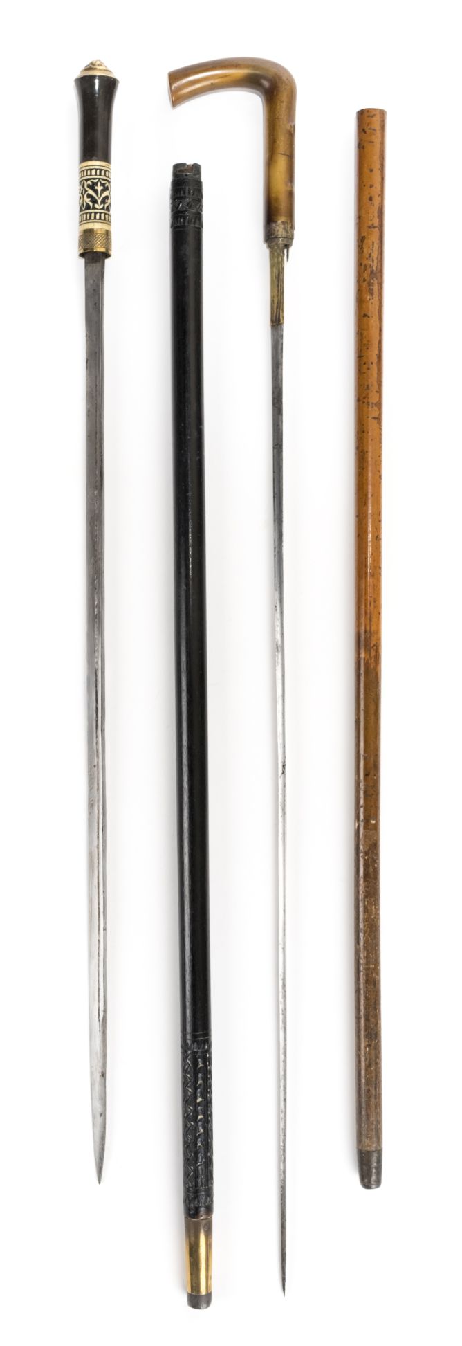 *Walking Stick. 19th century Colonial Indian sword stick, the ebony shaft with carved bone handle
