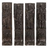 *Carved Oak Panels. Set of four antique carved oak panels, probably 17th century, carved as saints