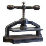 *Bookpress. A cast iron Victorian bookpress, finished in black, with brass handle ends & finial,