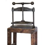 *Nipping press. A large cast iron nipping press by Harrild & Sons, London, platen size approximately