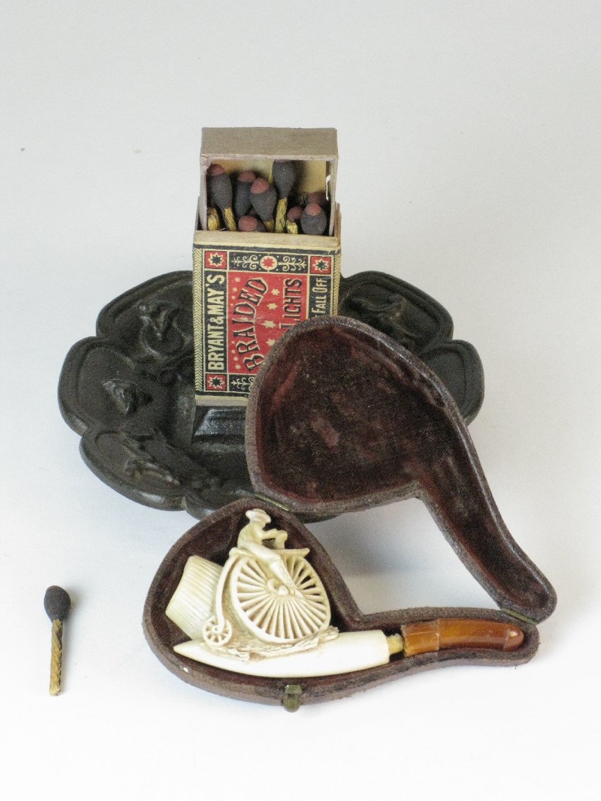 *Match Butler. Used on shop counters, a cast iron combination ashtray and match box holder with