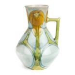 *Secessionist. Minton Secessionist pottery wash jug, model no.5, with tube lined foliate