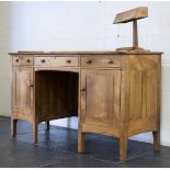 *Nixon (G., 20th century). Walnut and cedar desk, designed by G Nixon, Aldersley, Wellington, Salop,