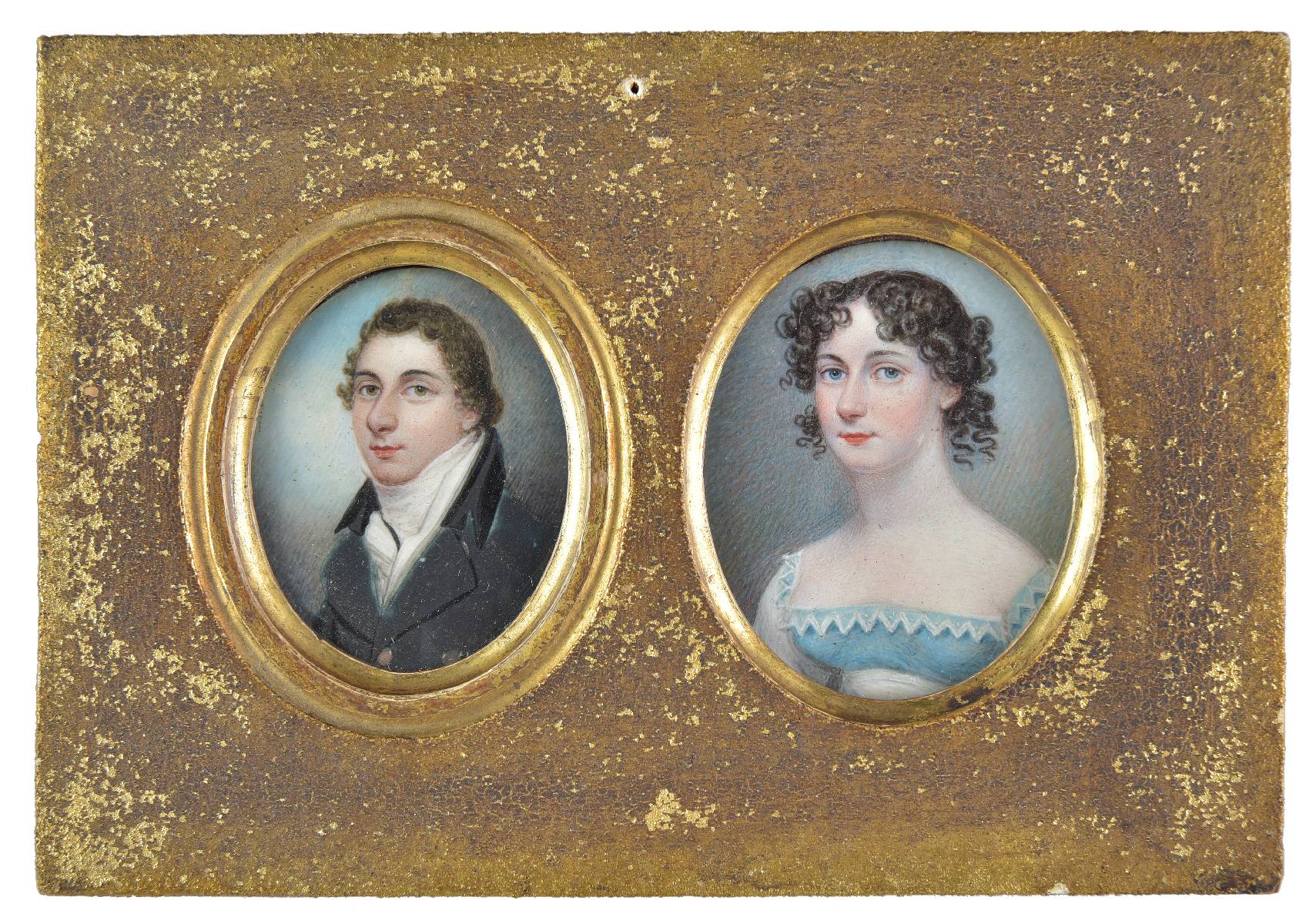 *Portrait Miniatures. A pair of oval portrait miniatures, circa 1814, two head and shoulder