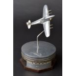 *Desktop Model. WWII aluminium model of a Hawker Hurricane, 16.5cm wingspan, mounted on a Merlin