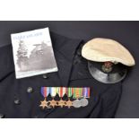*Royal Fleet Air Arm. A collection of items, including Officer's peaked hat with cloth badge,