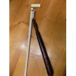 *Walking Stick. A Victorian marine whale bone walking stick, with rosewood spacers and ivory handle,