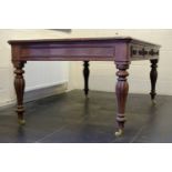 *Partners Table. A Victorian mahogany partners writing table, with red tooled leather top above 3