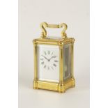 A FRENCH BRASS CASED REPEATING CARRIAGE CLOCK