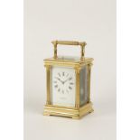 A FRENCH GILT BRASS REPEATING CARRIAGE CLOCK