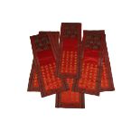 SET OF SIX SILK CORAL-RED WALL HANGINGS, EARLY 20TH CENTURY