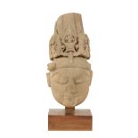 CARVED SANDSTONE HEAD OF A BODHISATTVA, KUSHAN STYLE