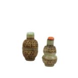 TWO CHINESE JADE RETICULATED REVOLVING SNUFF BOTTLES