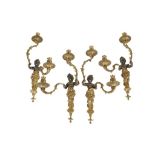 SET OF FOUR 20TH CENTURY BRONZE FIGURAL TWO-BRANCH WALL LIGHTS