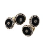 PAIR OF GENTLEMAN'S DIAMOND AND ONYX CUFFLINKS