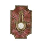 H MOSER & CIE: PINK HARDSTONE AND BRONZE MOUNTED TABLE CLOCK