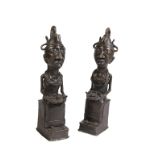 PAIR OF NIGERIAN BRONZES OF SEATED WOMEN