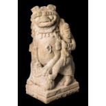 MONUMENTAL PAIR OF CARVED STONE BUDDHIST LIONS, MING DYNASTY