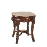 CARVED HUANGHUALI 'LOTUS' TABLE, QING DYNASTY, 19TH CENTURY